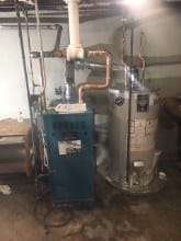 220. Burham Boiler with Bradford White Water Heater